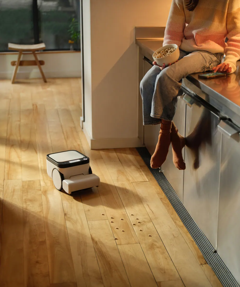 The Matic robot cleaning a kitchen floor